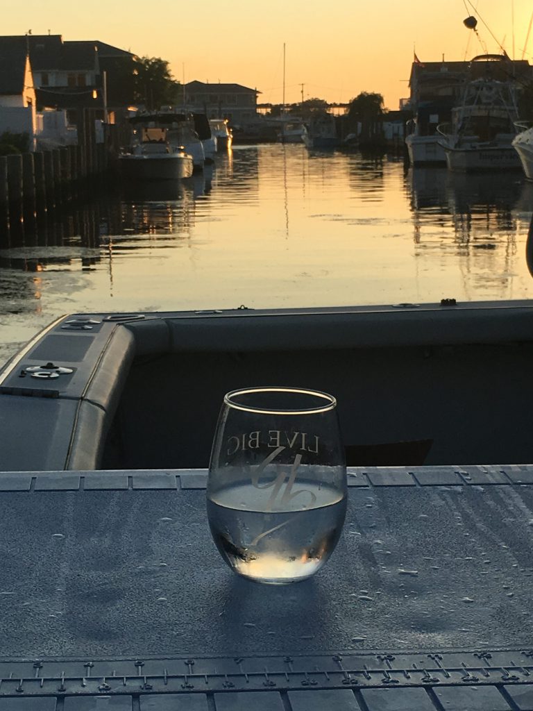 Submitted by Yusuf. While celebrating a family member's graduation from high school on a hot afternoon on Long Island, Yusuf and his wife Maegan enjoyed their Live Big glass and sunset view.